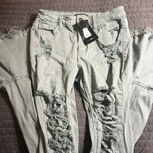 Fashion Nova Ripped Light Gray Skinny Jeans